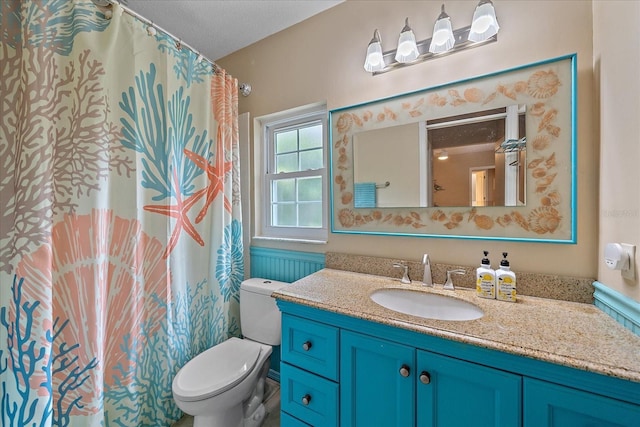 1432 Colony Pl, Venice, FL 34292 - full bath with toilet, vanity, and a textured ceiling