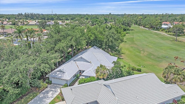 1432 Colony Pl, Venice, FL 34292 - aerial perspective of suburban area with a local golf course