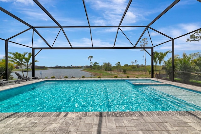 swimming pool featuring an in-ground hot tub, a lanai, a patio, and a water view