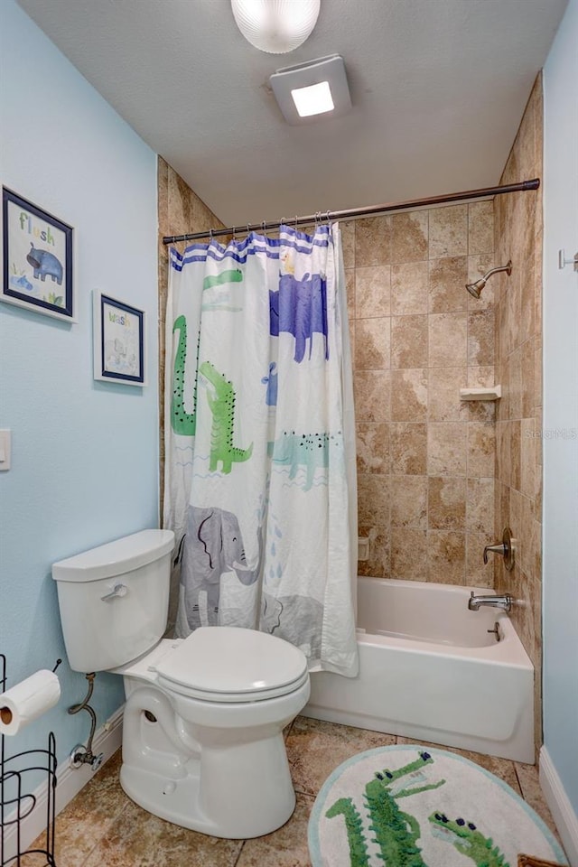 bathroom featuring toilet, shower / tub combo, baseboards, and tile patterned flooring
