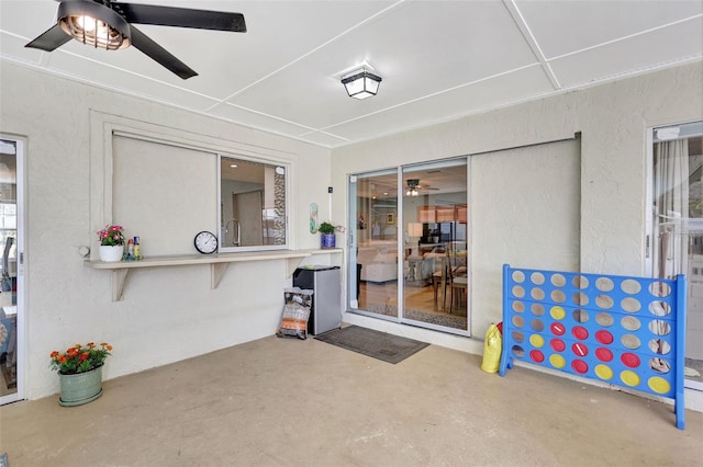 view of patio / terrace featuring a ceiling fan