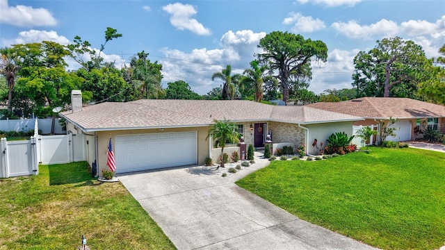 single story home with a gate, a garage, driveway, stucco siding, and a chimney