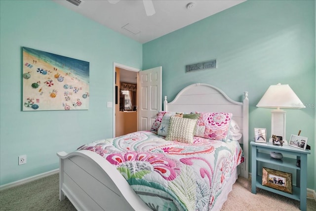 13180 SW Pembroke Cir N, Lake Suzy, FL 34269 - bedroom with carpet flooring, baseboards, and ceiling fan