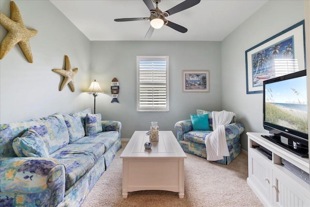 13180 SW Pembroke Cir N, Lake Suzy, FL 34269 - living area featuring light colored carpet and a ceiling fan