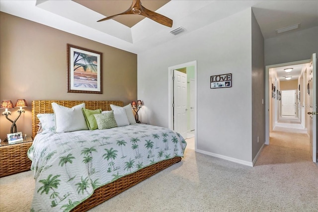 13180 SW Pembroke Cir N, Lake Suzy, FL 34269 - bedroom featuring carpet flooring, baseboards, a raised ceiling, and a ceiling fan