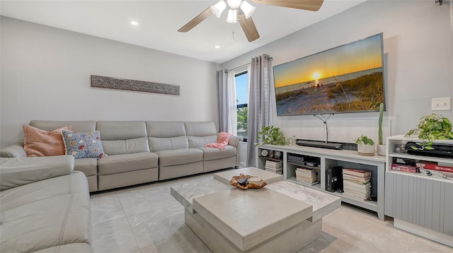 living room featuring ceiling fan, light marble finish flooring, and recessed lighting