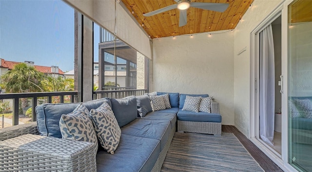 balcony featuring outdoor lounge area and a ceiling fan