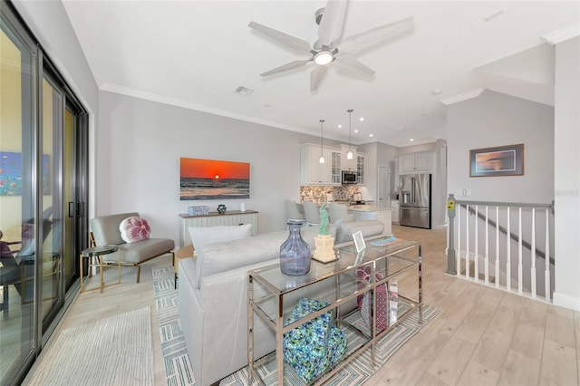 5561 Cannes Cir Unit 5101, Sarasota, FL 34231 - living area with a ceiling fan, light wood-type flooring, ornamental molding, recessed lighting, and baseboards