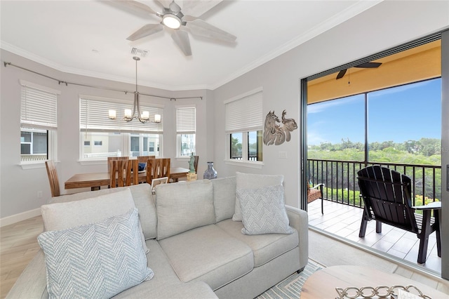 5561 Cannes Cir Unit 5101, Sarasota, FL 34231 - living area featuring ceiling fan, light wood-type flooring, a chandelier, baseboards, and crown molding