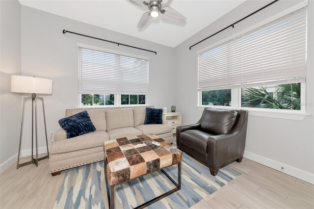 5561 Cannes Cir Unit 5101, Sarasota, FL 34231 - living area with baseboards, light wood-style flooring, and a ceiling fan