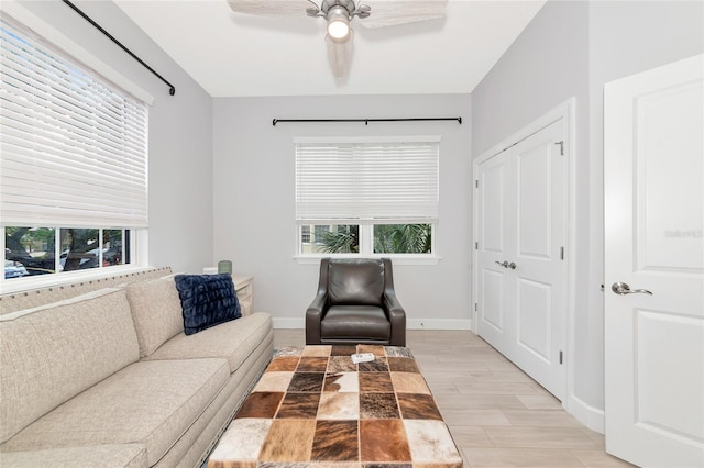 5561 Cannes Cir Unit 5101, Sarasota, FL 34231 - sitting room with a ceiling fan, baseboards, and light wood-type flooring