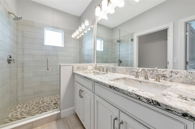 5561 Cannes Cir Unit 5101, Sarasota, FL 34231 - full bath featuring a stall shower and double vanity