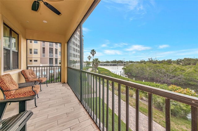 5561 Cannes Cir Unit 5101, Sarasota, FL 34231 - balcony with a water view and a ceiling fan