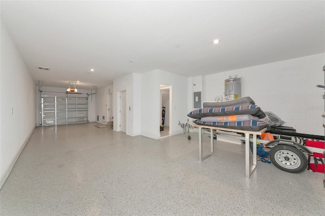 5561 Cannes Cir Unit 5101, Sarasota, FL 34231 - garage featuring water heater, electric panel, recessed lighting, and baseboards