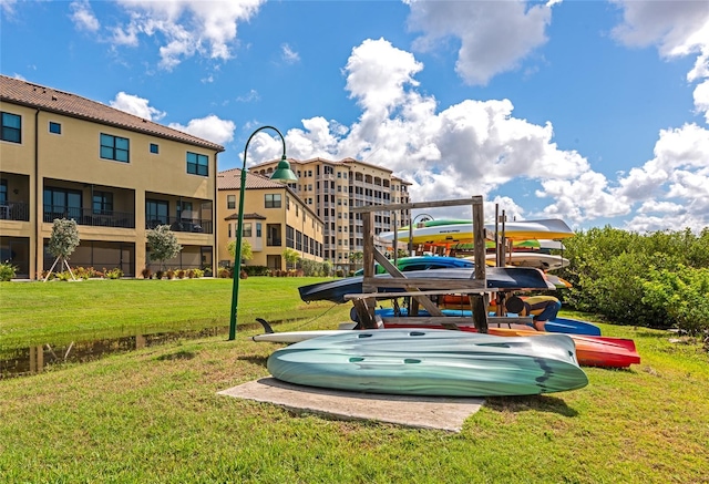 5561 Cannes Cir Unit 5101, Sarasota, FL 34231 - surrounding community featuring a lawn