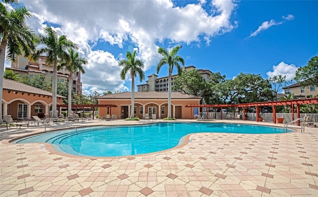 5561 Cannes Cir Unit 5101, Sarasota, FL 34231 - community pool featuring a patio and fence