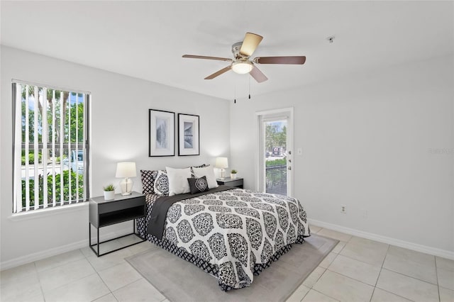 tiled bedroom featuring access to outside, baseboards, and ceiling fan