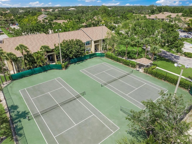 4037 Crockers Lake Blvd Unit 17, Sarasota, FL 34238 - view of tennis court with fence
