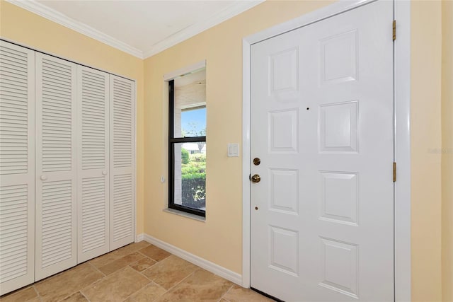 4471 Atwood Cay Cir Unit 13, Sarasota, FL 34233 - foyer featuring baseboards, ornamental molding, and light stone finish floors