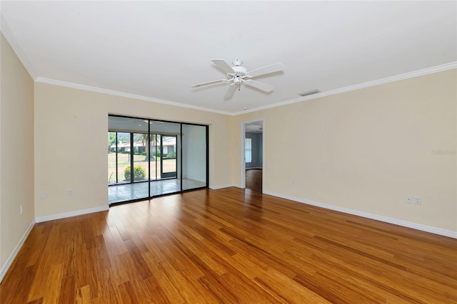 4471 Atwood Cay Cir Unit 13, Sarasota, FL 34233 - spare room featuring light wood-style flooring, baseboards, crown molding, and ceiling fan