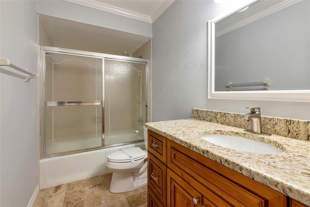 4471 Atwood Cay Cir Unit 13, Sarasota, FL 34233 - bathroom featuring toilet, ornamental molding, vanity, enclosed tub / shower combo, and stone finish floors