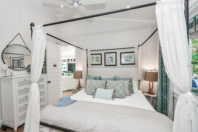 102 48th St, Holmes Beach, FL 34217 - bedroom with vaulted ceiling and wood finished floors