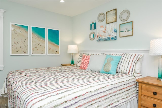 102 48th St, Holmes Beach, FL 34217 - bedroom with a decorative wall, a wainscoted wall, and recessed lighting
