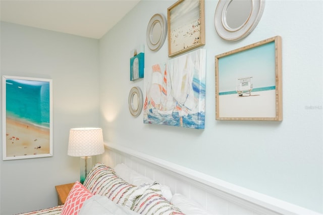 102 48th St, Holmes Beach, FL 34217 - bedroom featuring a wainscoted wall