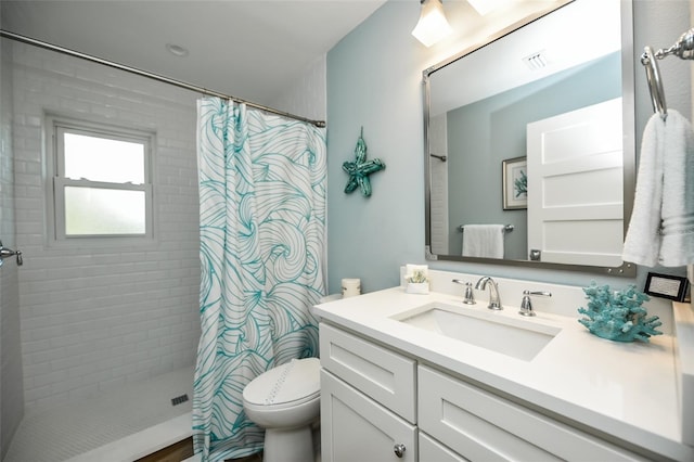 102 48th St, Holmes Beach, FL 34217 - full bathroom with tiled shower, vanity, and toilet