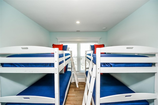 102 48th St, Holmes Beach, FL 34217 - bedroom featuring wood finished floors and recessed lighting