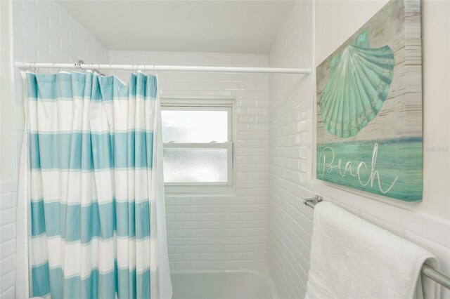 102 48th St, Holmes Beach, FL 34217 - full bath with shower / bath combo with shower curtain