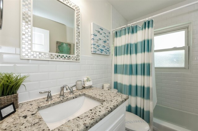 102 48th St, Holmes Beach, FL 34217 - full bathroom with toilet, tasteful backsplash, vanity, and shower / bath combination with curtain