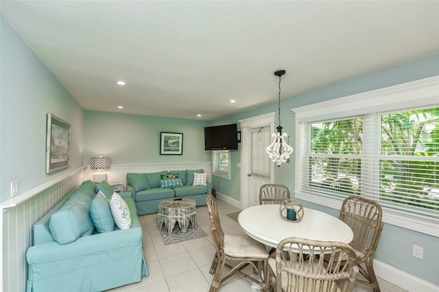 102 48th St, Holmes Beach, FL 34217 - living area featuring light tile patterned flooring