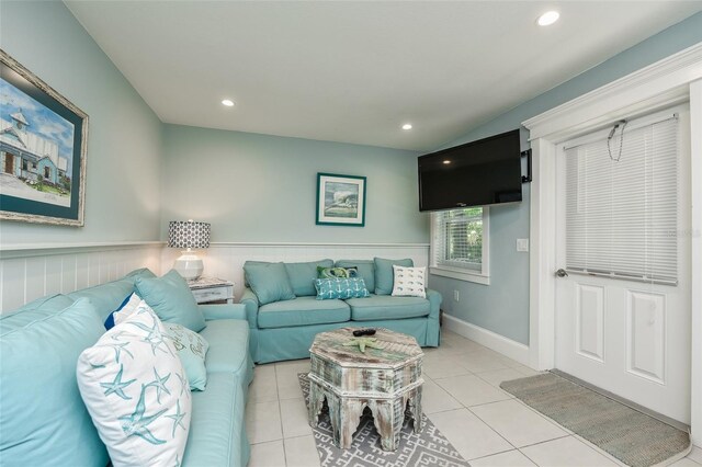 102 48th St, Holmes Beach, FL 34217 - living room with recessed lighting, light tile patterned flooring, and baseboards