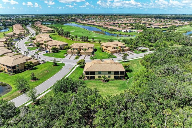 6907 Grand Estuary Trl Unit 104, Bradenton, FL 34212 - aerial view of residential area with a large body of water and a golf course
