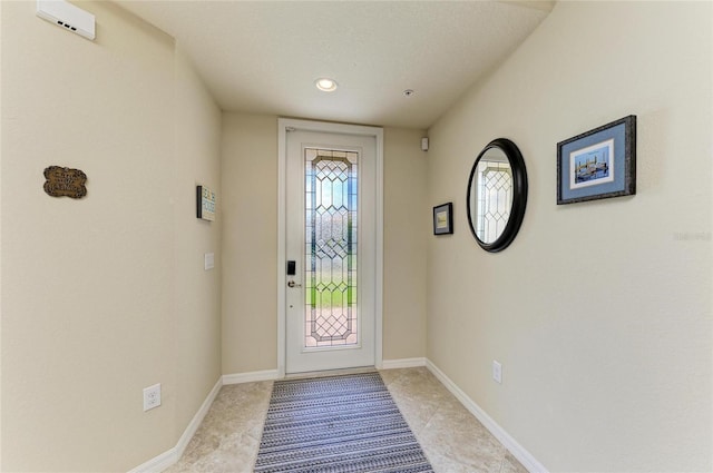 6907 Grand Estuary Trl Unit 104, Bradenton, FL 34212 - foyer with light tile patterned flooring, recessed lighting, and baseboards