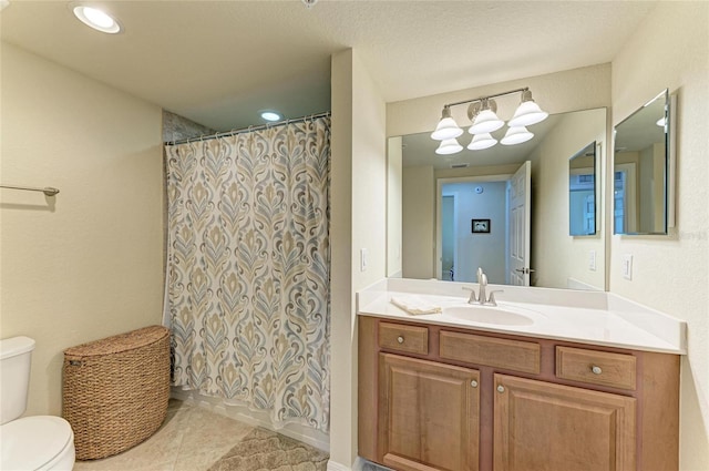 6907 Grand Estuary Trl Unit 104, Bradenton, FL 34212 - full bath with toilet, vanity, curtained shower, and tile patterned floors