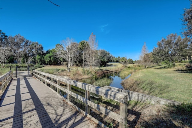 12822 Del Corso Loop, Bradenton, FL 34211 - dock featuring a water view and a lawn