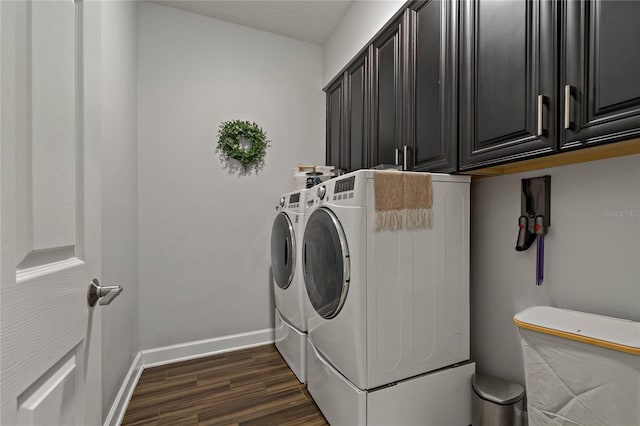 5805 49th Ct E, Ellenton, FL 34222 - laundry room featuring independent washer and dryer, dark wood-style flooring, baseboards, and cabinet space