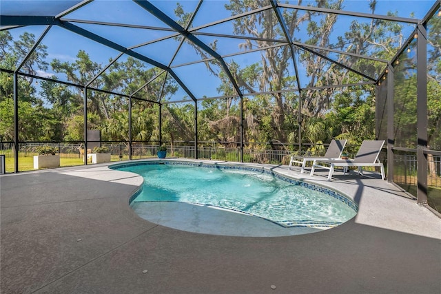 5805 49th Ct E, Ellenton, FL 34222 - view of swimming pool featuring a patio area, view of scattered trees, and a lanai