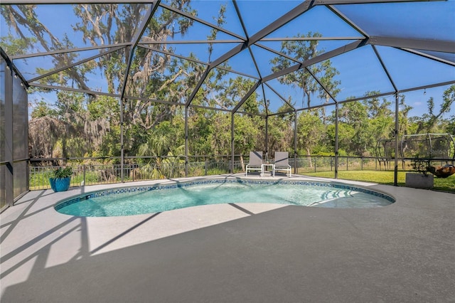 5805 49th Ct E, Ellenton, FL 34222 - view of swimming pool featuring a patio, a lanai, and view of wooded area