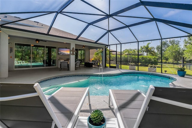 5805 49th Ct E, Ellenton, FL 34222 - outdoor pool with a patio, a ceiling fan, and glass enclosure