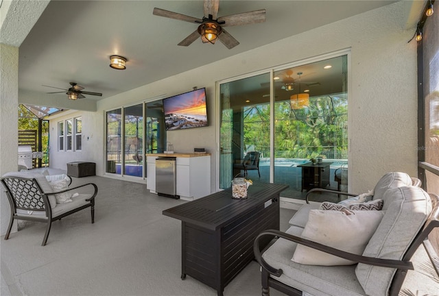5805 49th Ct E, Ellenton, FL 34222 - sunroom with ceiling fan and outdoor lounge area