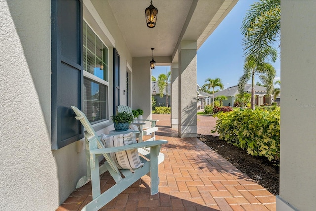 5805 49th Ct E, Ellenton, FL 34222 - view of patio featuring covered porch and a residential view