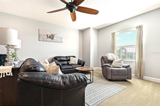 5805 49th Ct E, Ellenton, FL 34222 - living area with a ceiling fan, light carpet, and baseboards