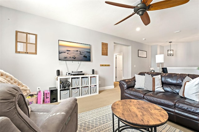 5805 49th Ct E, Ellenton, FL 34222 - carpeted living area with ceiling fan and baseboards