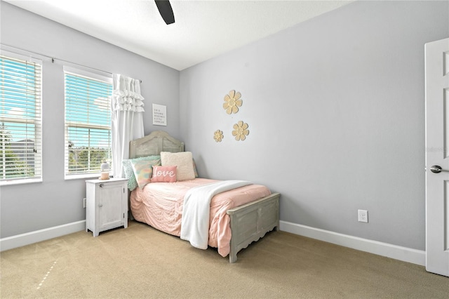 5805 49th Ct E, Ellenton, FL 34222 - bedroom with light carpet, baseboards, and a ceiling fan
