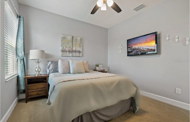 5805 49th Ct E, Ellenton, FL 34222 - carpeted bedroom with baseboards and a ceiling fan