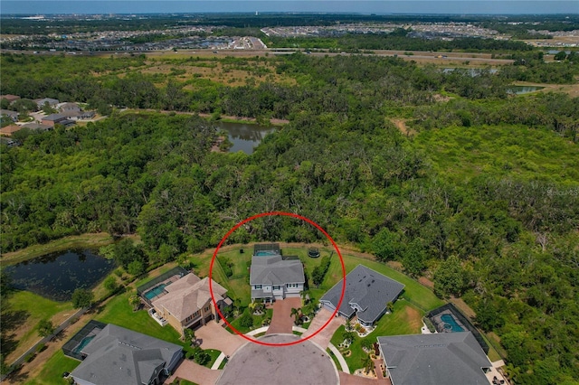 5805 49th Ct E, Ellenton, FL 34222 - aerial view of residential area with a nearby body of water and a forest