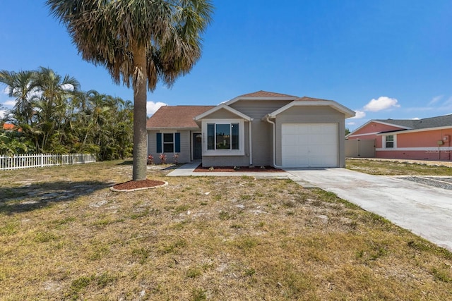 single story home with a garage, driveway, and brick siding